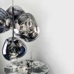 Tom Dixon Melt Chandelier Small -Raumbeleuchtungs Geschäft 010 Tom Dixon Melt Chandelier Small ambient 126309 Chrom bb35a09452900502a100a7f580e54c3a